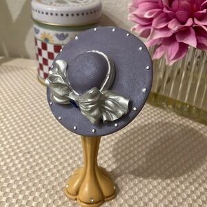 Polystone Collectible Purple and Silver Wide Brimmed Hat on a Stand